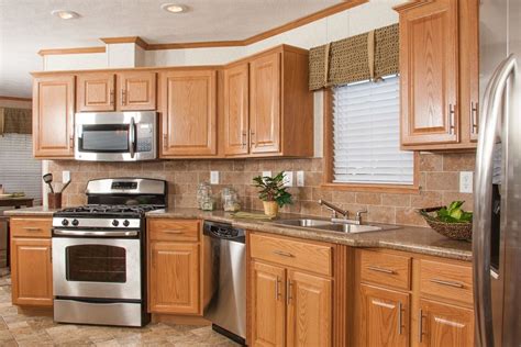 golden oak cabinets and stainless steel appliances|new oak cabinets.